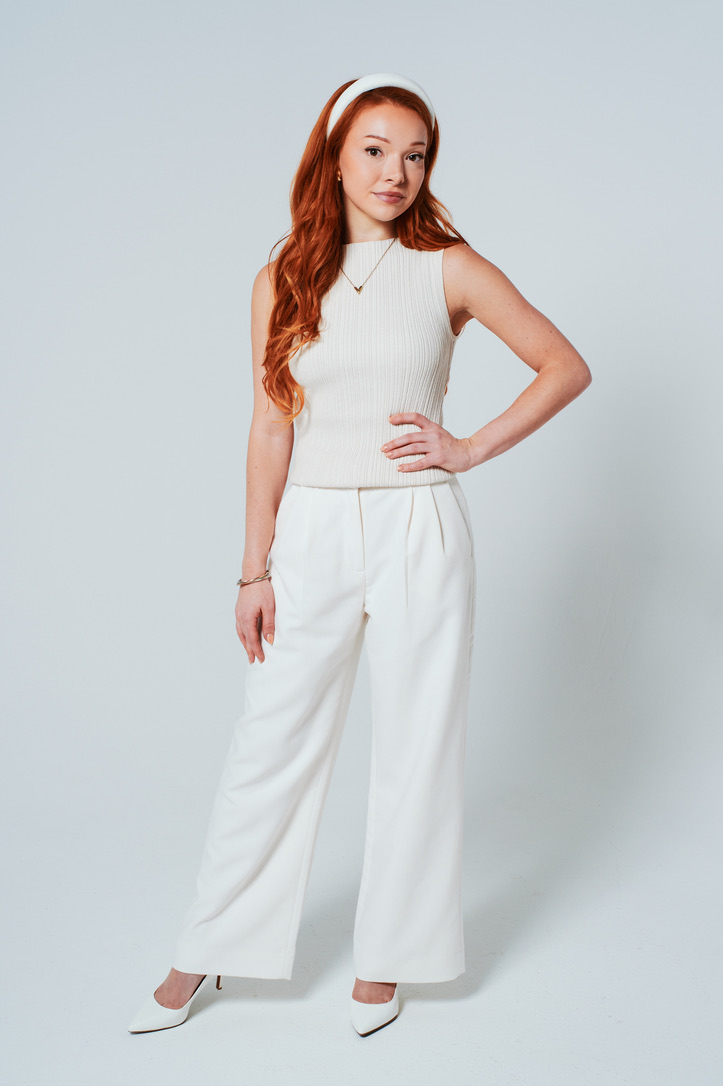 Courtney Sardana modeling an all-white look